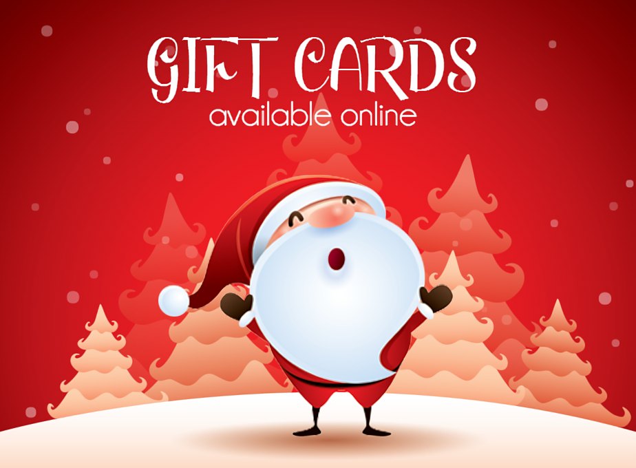 Gift cards available online: a cheerful Santa among snowy trees