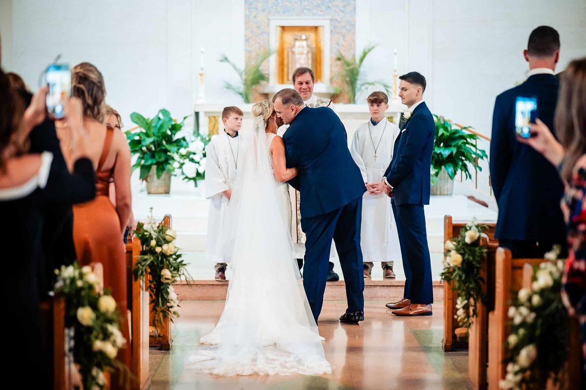 Bride and groom at the altar