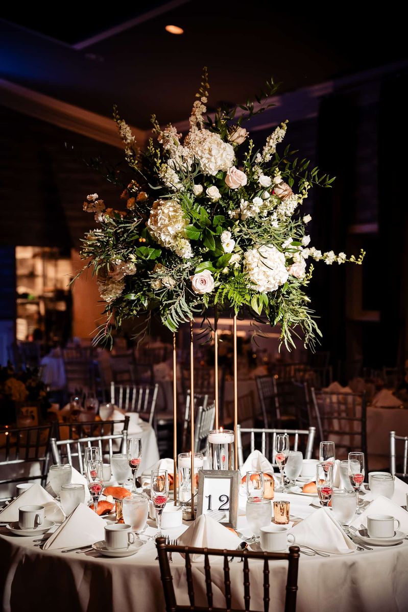 Tall floral centerpiece at the reception