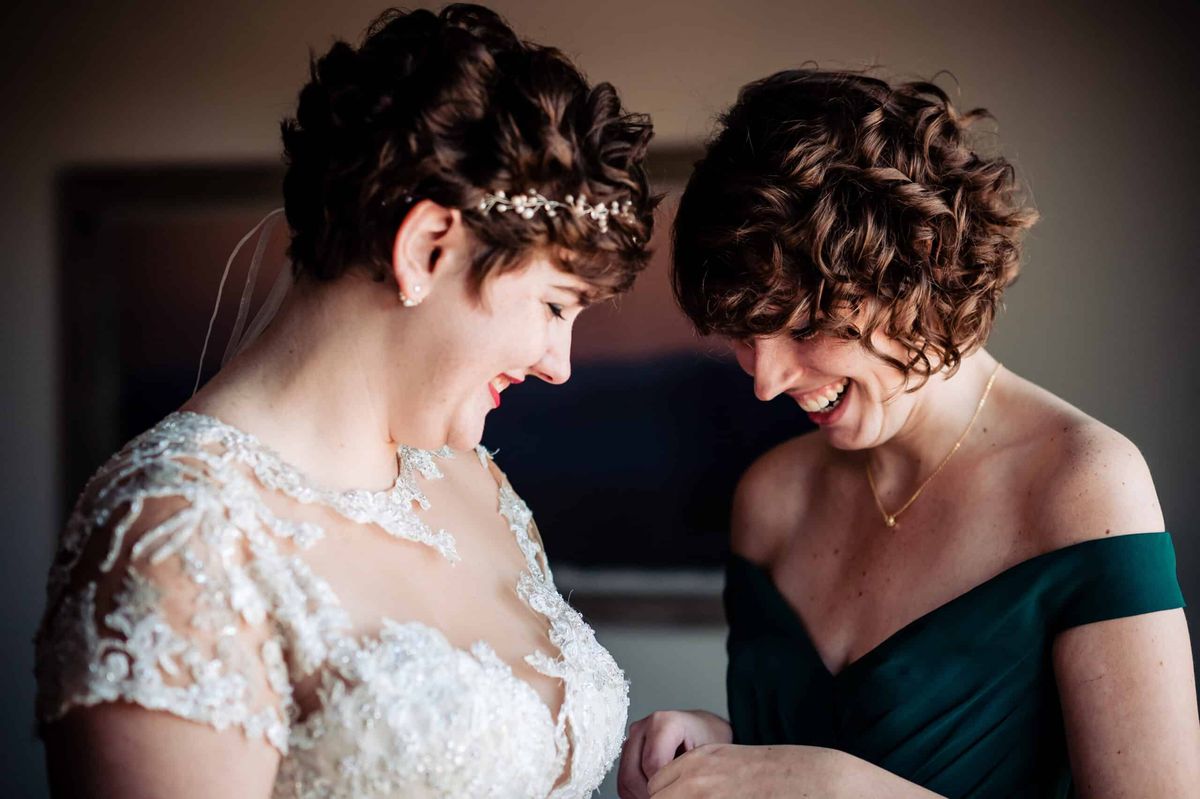 Bride sharing a quiet moment before the ceremony