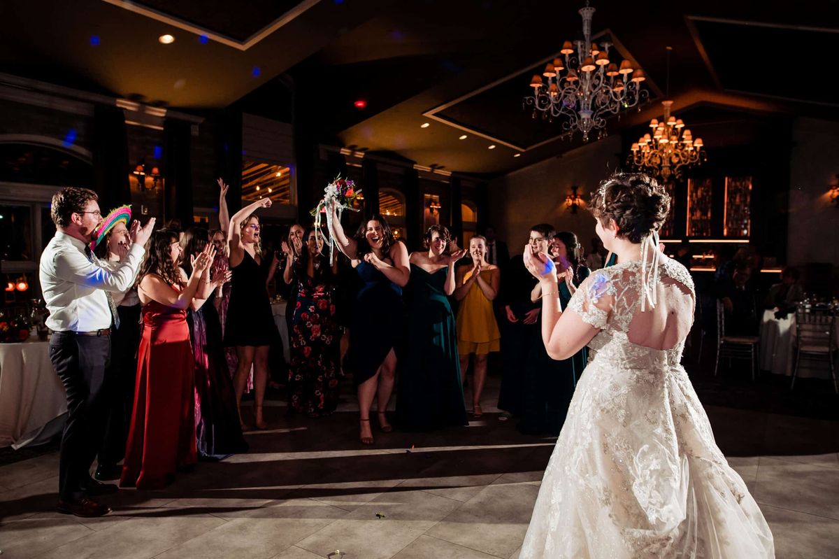 Bride dancing with her guests