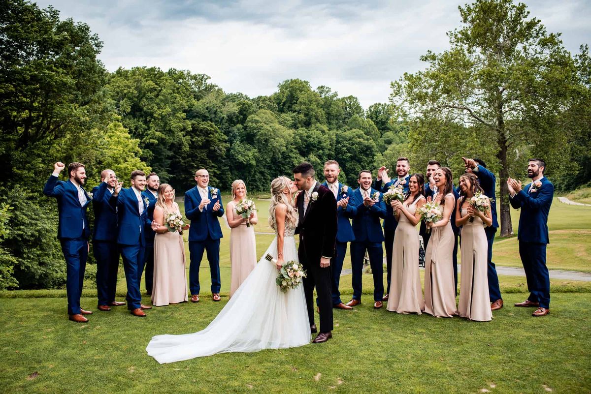 The full wedding party on the lawn